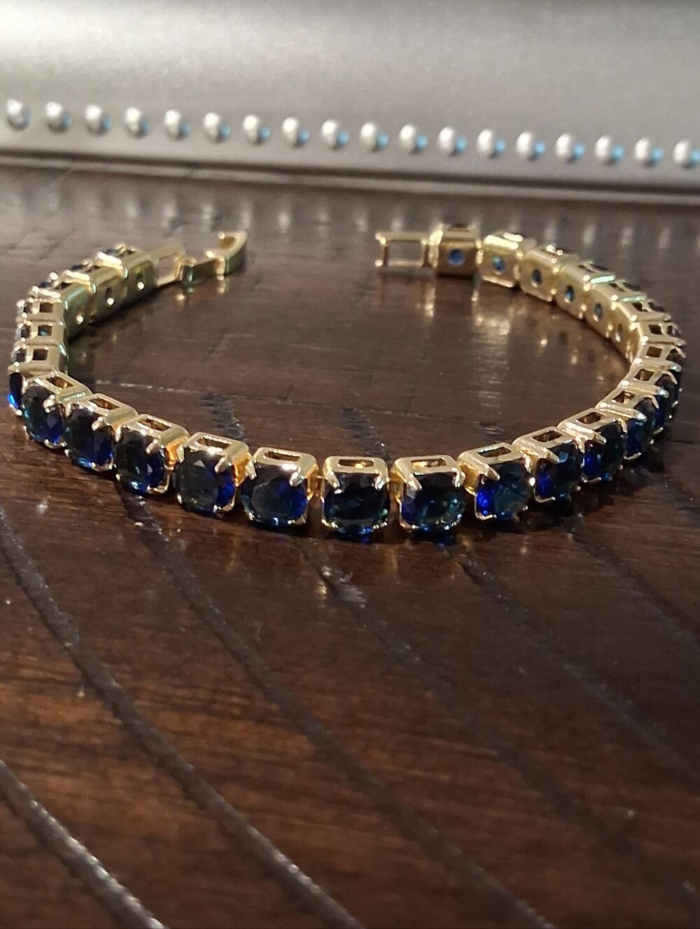 Gold Tennis Bracelet with Deep Blue Stones - Picture 2 of 5